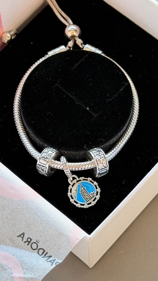 Pandora bracelet with 3 charms