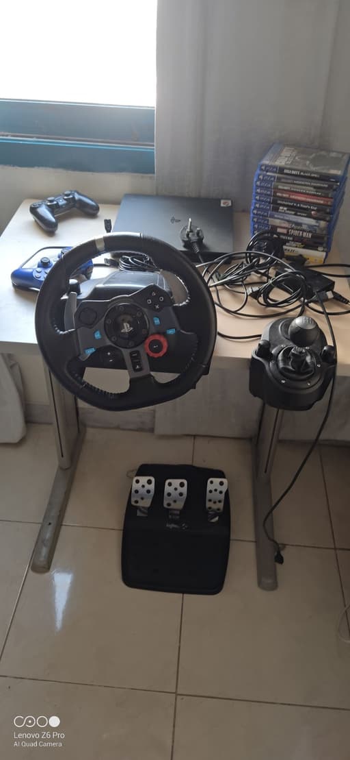 Logitech G29 Racing Wheel Bundle with PS4 Slim, Shifter, Pedals & Games